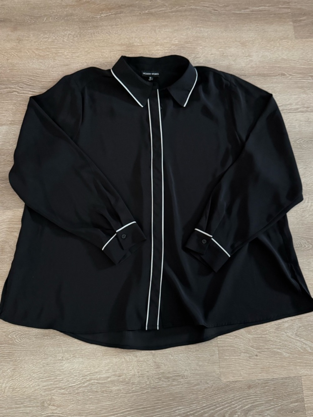 Silky Black Button-Down Blouse with White Piping